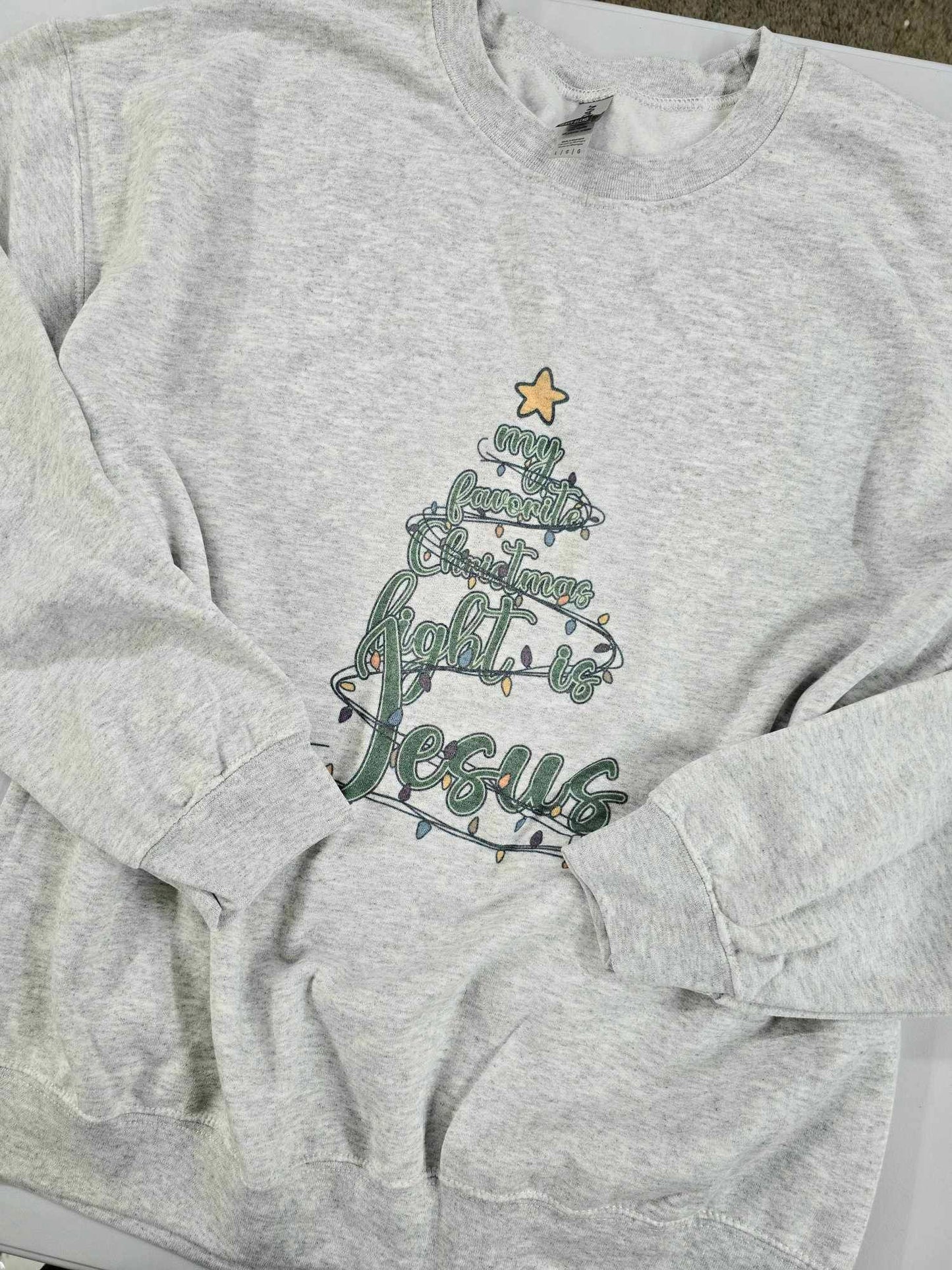 Size Large. My Favorite Christmas Light. Pearl Grey Crewneck.