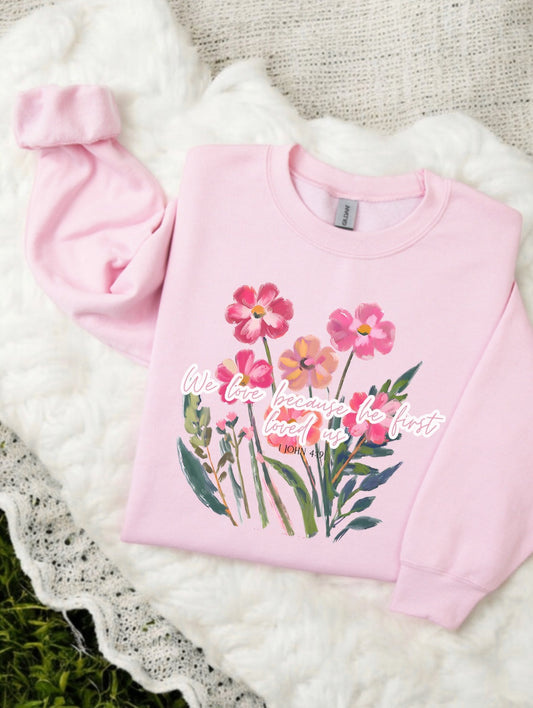 We Love Becuase He First Loved Us. Petal Pink Crewneck Sweatshirt.